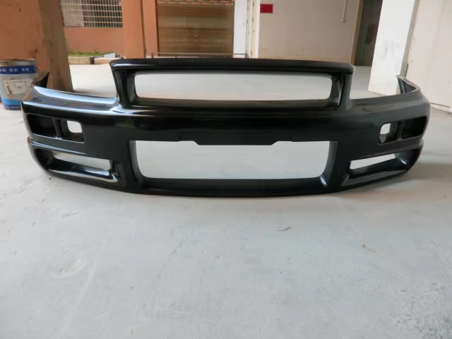 For CF 1999-2002 Skyline R34 GTR NI Style Front Bumper Carbon Fiber — 2